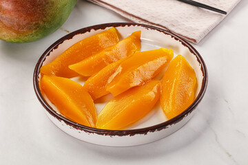 Canned mango slices in the bowl