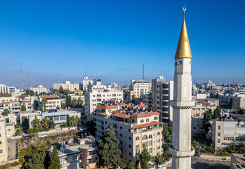 Gold-clad minaret at a mosque in downtown Ramallah, the capital of the Palestinian Territories in the West Bank