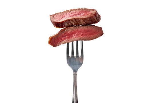 Slices of beef steak on vintage fork isolated on transparent or white background