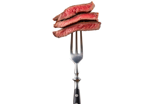 Slices of beef steak on vintage fork isolated on transparent or white background