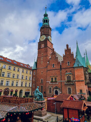 Fototapeta premium Christmas Market at Wrocław Market Square(Rynek) with the Town hall in sight , Wroclaw(Breslau), Silesia, Poland