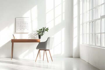 A minimalistic, bright home office with a large calendar on the wall, a sleek wooden desk