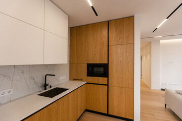 real estate Luxury interior design pool villa in kitchen area and built in furniture