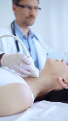 Doctor man wearing white protective gloves is using ultrasound machine to examine neck of female patient in hospital. Medicine, thyroid gland health