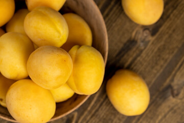 ripe soft apricot fruits on the cutting board