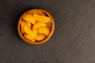 peeled orange tangerines marinated in sugar syrup