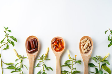 wooden spoon with soft gels, Fish oil capsules, omega 3, omega 9, vitamin D, vitamin E