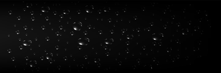 Rain transparent drops flow down the glass.Realistic wet condensation texture.Fresh water splash effect on the surface.Liquid spreading droplet shapes.