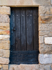 a closeup shot of an old wooden door