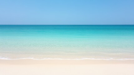 Pristine white sand beach meets azure waters under a vibrant blue sky inviting