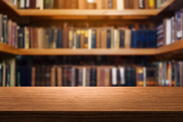 empty wooden table top blurred library or book store setting with books and reading material.Wooden tabletop over defocused bookcase background. product promotion in the library.