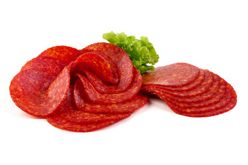 Spanish pork chorizo sausage slices, close-up, isolated on white background.