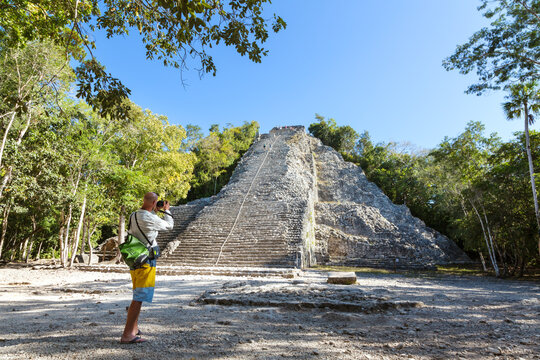 Tourist visiting the mayan ruins of Coba, Quintana Roo, Mexico
