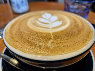 Cup of coffee close view background, breakfast with coffee