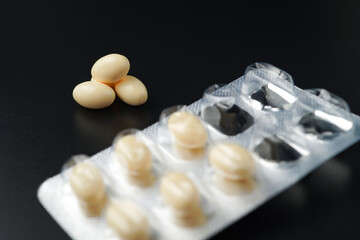 Vitamin in white soft gels capsules, Fish oil, omega 3, omega 9, vitamin D, vitamin E