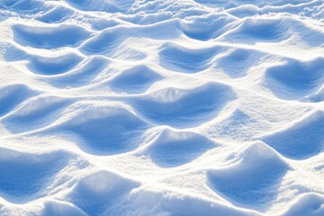 Merry Christmas and a Happy New Year to you! A beautiful snowy surface under the bright winter sun, with shadows on the snow.