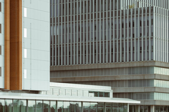 New construction high-rise office buildings in a metro city center symbolize technological advancement, modern urban design, and the growing corporate landscape in Rotterdam