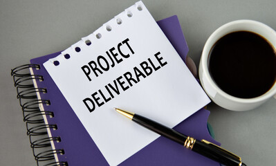 PROJECT DELIVERABLE - words on a white sheet with a cup of coffee
