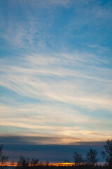 This image beautifully captures the subtle hues of a winter sunset