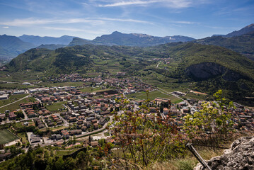A stunning view of the town of Mori, Trentino, Italy, captured from Monte Albano via ferrata. The...