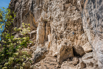 Ottorino Marangoni - Monte Albano Via Ferrata (Klettersteig ) in the Alps offers a thrilling climb, sports tourism, above Mori town, near Lago di Garda, Trentino, Italy.