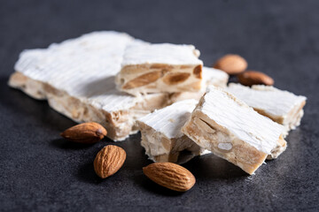 Christmas almond nougat on black slate background
