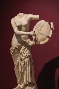 Shielded Aphrodite. Ancient marble statue with a broken head and arm, holding a shield with Greek inscriptions. Antalya Archeological museum. July 28, 2023. Antalya, Turkey (Turkiye)