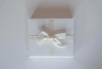 white gift box with bow