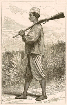 A Zanzibari rebel carrying a rifle