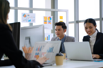 White collar workers are meeting at modern office.