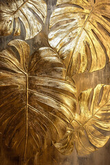 Vertical golden printable wall art of monstera leaves. Decorative print artwork