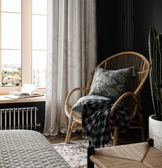 Luxury bedroom interior with wicker armchair and window with city view
