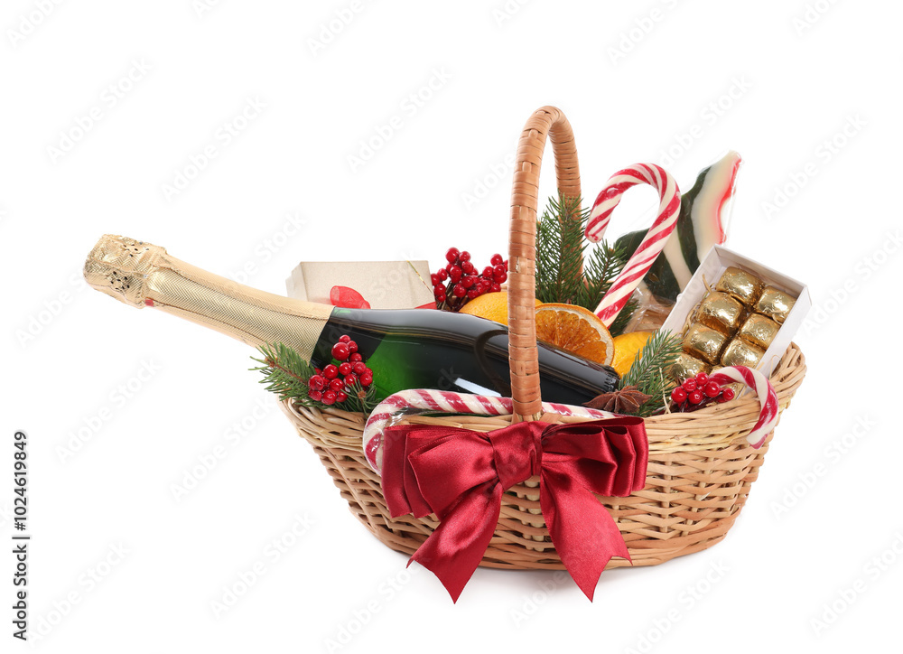 Canvas Prints Wicker gift basket with sparkling wine isolated on white