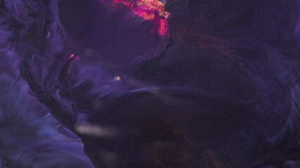 An event featuring an automotive lighting display creates a mesmerizing scene in a cave with a purple backdrop, illuminating the darkness with hues of electric blue, magenta, and violet petals