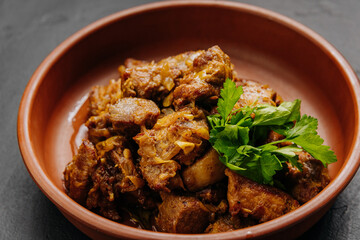 Traditional homemade roasted meat with onions and greens, food photography and culinary blogs
