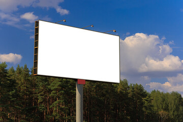 Background for design. Advertising billboard along the road in the city on a sunny day