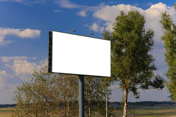 Background for design. Advertising billboard along the road in the city on a sunny day