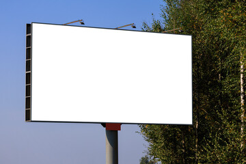 Background for design. Advertising billboard along the road in the city on a sunny day