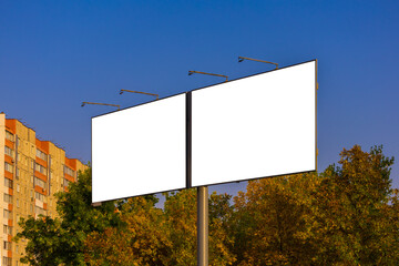 Background for design. Advertising billboard along the road in the city on a sunny day