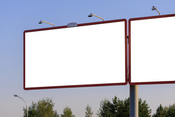 Background for design. Advertising billboard along the road in the city on a sunny day