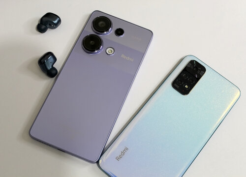 Kyiv, Ukraine. 10.10.2024: New smartphone Xiaomi redmi note 13 Pro and Xiaomi redmi note 11 and Redmi Buds 4 model. Stock editorial photo.