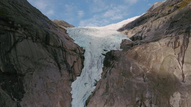 Aerial Briksdalsbreen Glacier in Norway, Briksdal, Scandinavia with thick ice. Epic mountain nature.