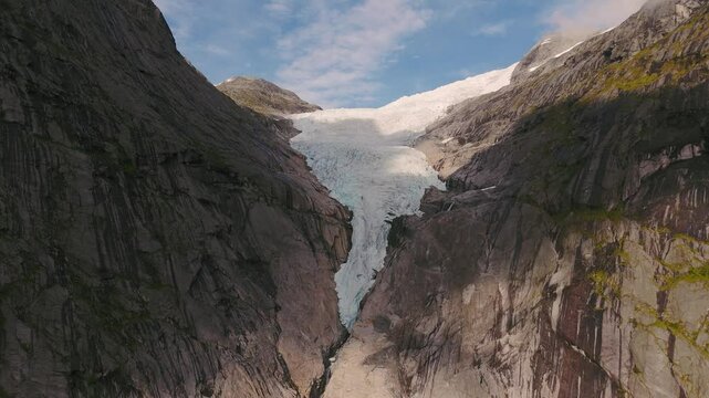 Briksdalsbreen Glacier in Norway, Briksdal, Scandinavia with thick ice. Mountain sightseeing nature.