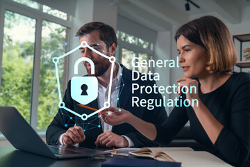 Business discussion on data protection regulation with graphics overlay.