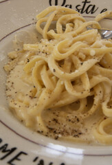 Tagliolini alla Romana cacio e pepe is a traditional Italian dish