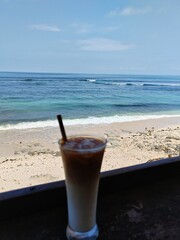 Ice coffee  on the beach
