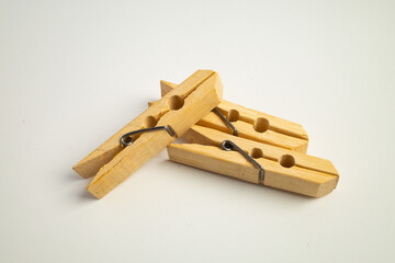 Wooden Clothespins on White Background