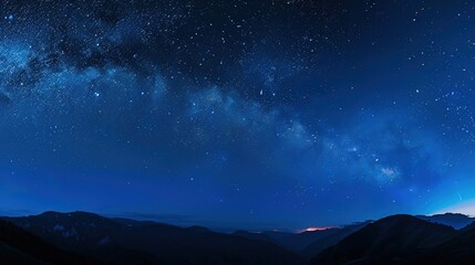 Fototapeta premium Panoramic blue night sky with milky way and stars on dark background. Fill the universe, nebulae and galaxies with noise and particles. Dark night sky.