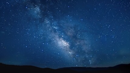 Fototapeta premium Panoramic blue night sky with milky way and stars on dark background. Fill the universe, nebulae and galaxies with noise and particles. Dark night sky.