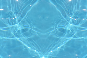 Blue water with ripples on the surface. Defocus blurred transparent blue colored clear calm water...